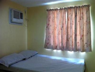 Amethyst Econotel Santa Rosa (Laguna) Quarto foto